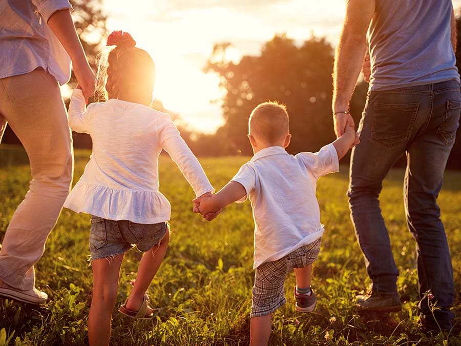 Elm Estates - 1708502936355 Family with Young Kids outside behind angle2 Elm Estates - 1708502936355 Family with Young Kids outside behind angle2